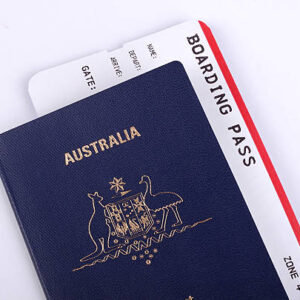 One new Australian passport with an international boarding pass inserted inside the document.